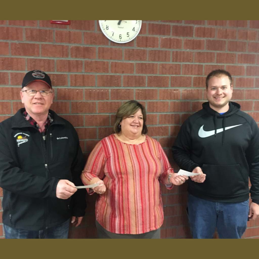 Tom Morley and Matt Morley present endowment scholarship to Tami Riley of Redwood Area Education Foundation in memory of Gordy Jensen