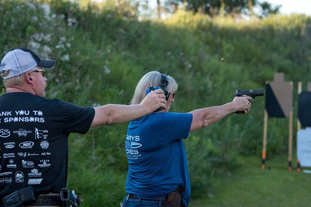 woman shooting a pistol