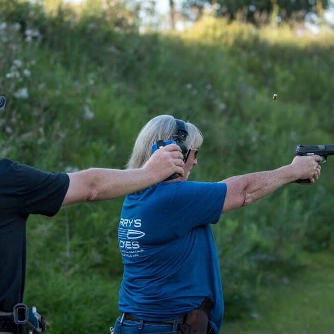 woman shooting a pistol